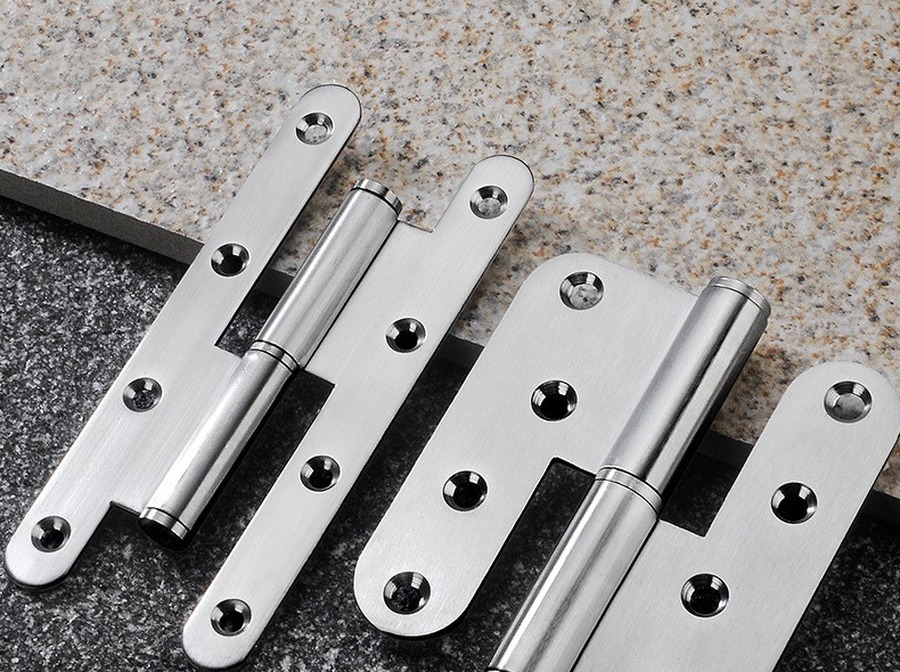 Lift-off hinges laid on a granite surface