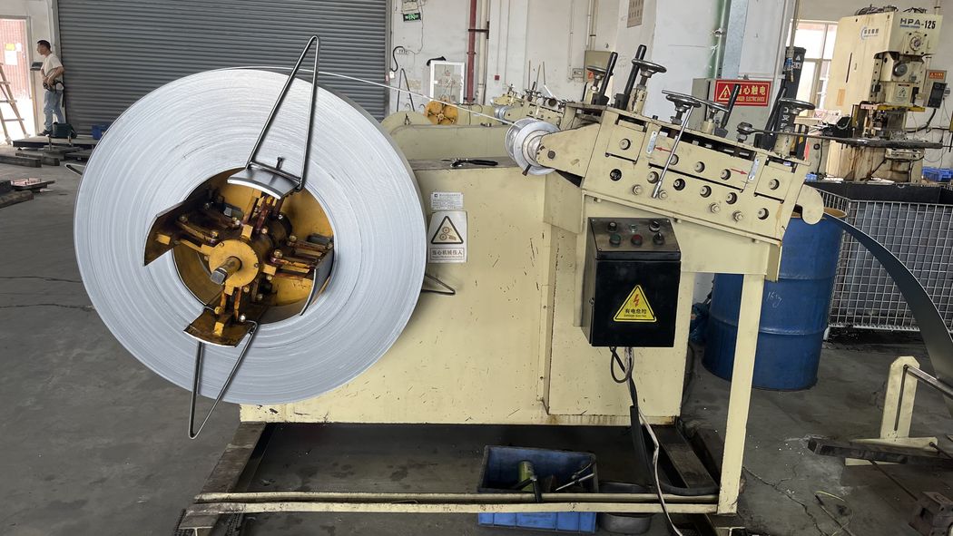 Steel coil loaded on the decoiler.