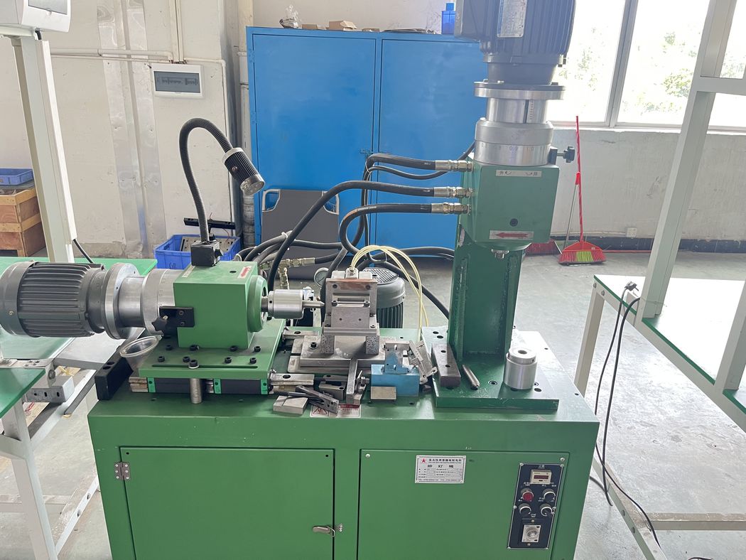 Automated riveting and assembly machine.