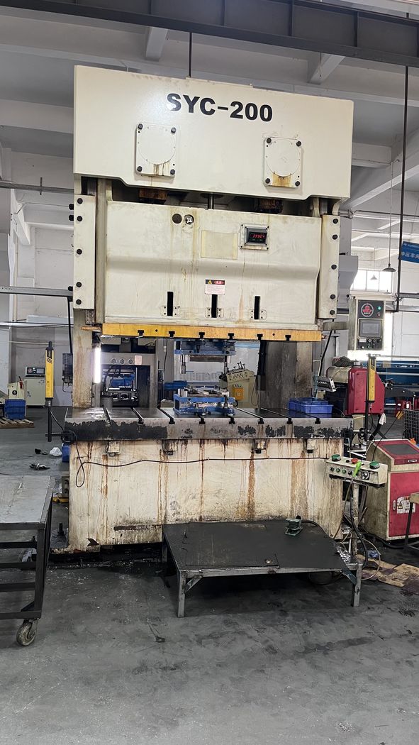 Press with the die set in place.