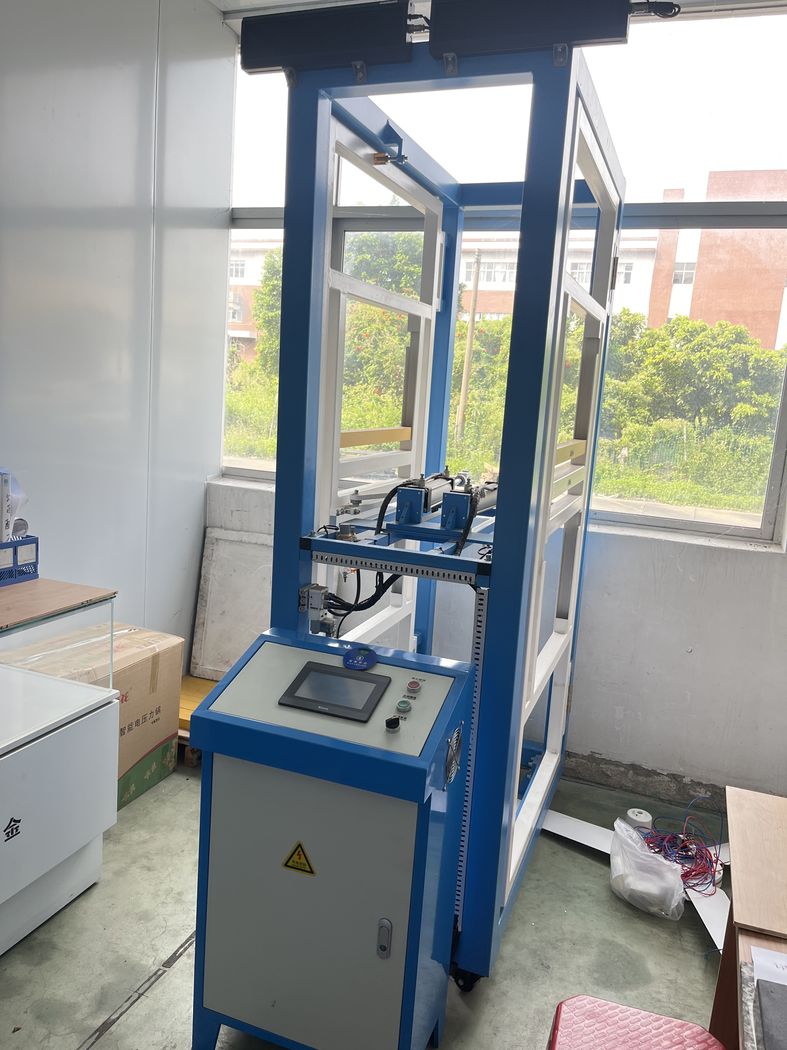 Test rig &mdash; enclosed frame with touch-screen control.